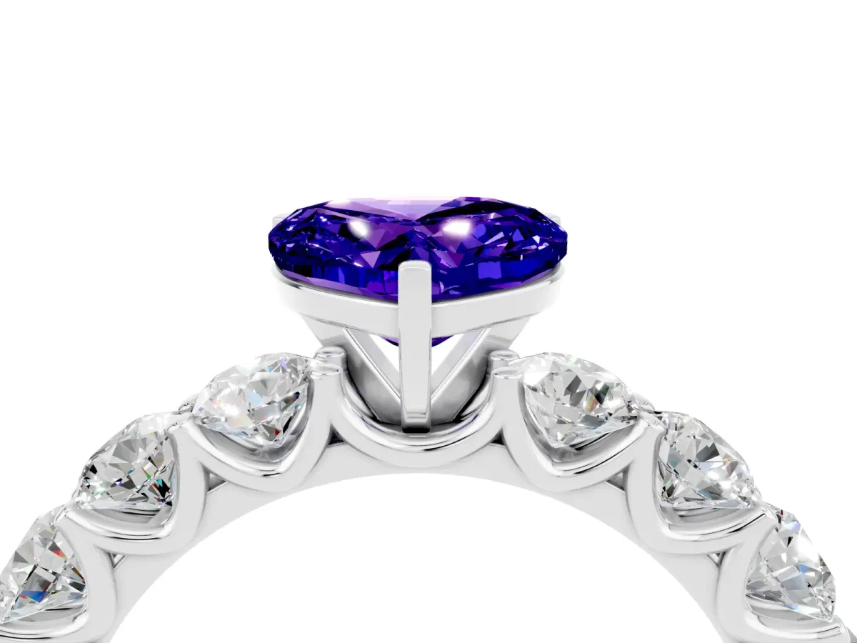Heart Cut Tanzanite Prong Setting with Side Stones on a Pave Band Silver