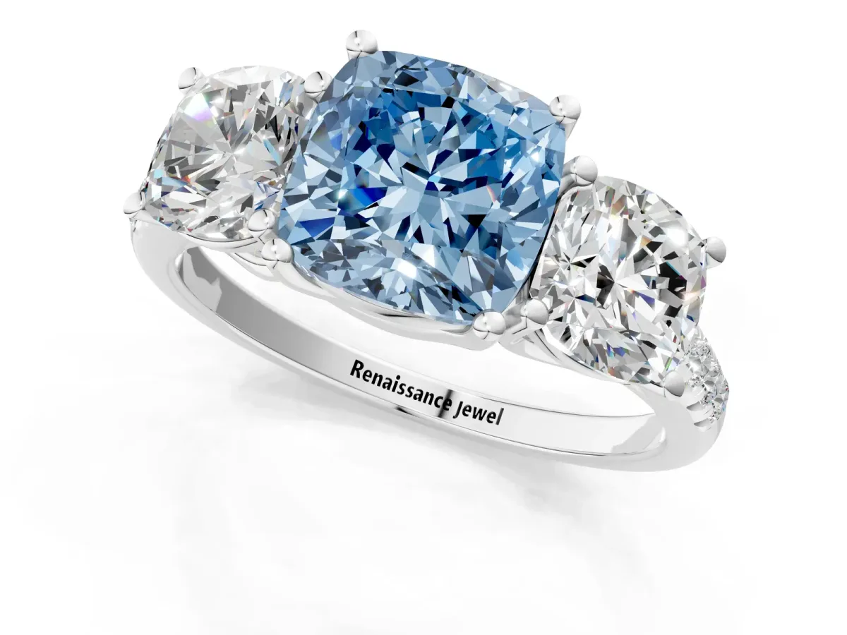 Fancy Blue Three-Stone Cushion Cut Diamond Ring with Round Pavé Band and Prong Setting Platinum