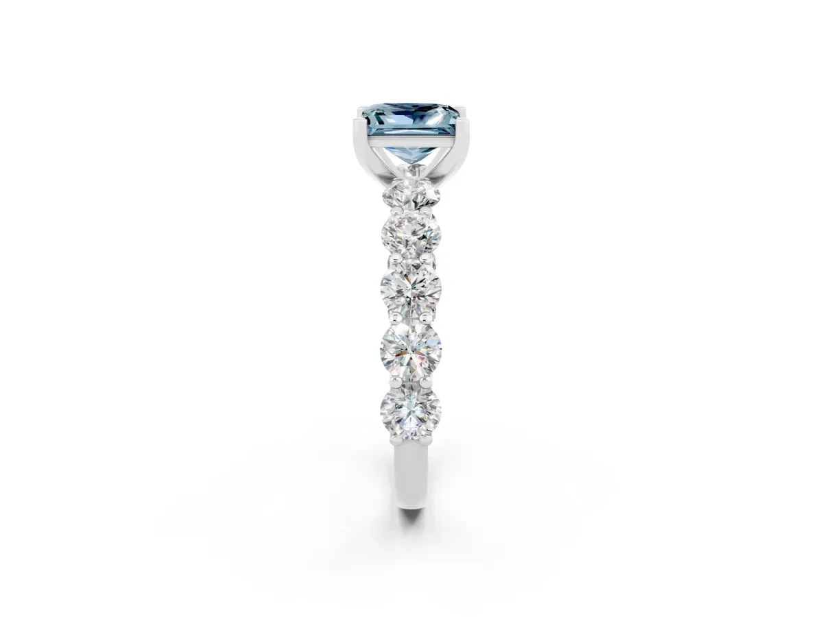 Princess Cut Aquamarine Prong Setting with Side Stones on a Pave Band Silver
