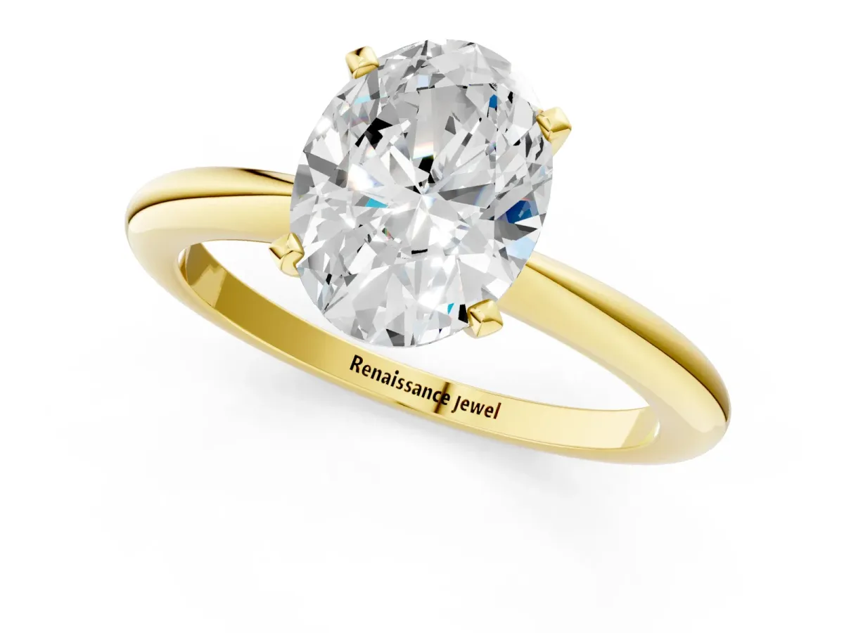 Oval Cut Diamond Solitaire Ring with Six-Prong Setting and Classic Band Yellow gold