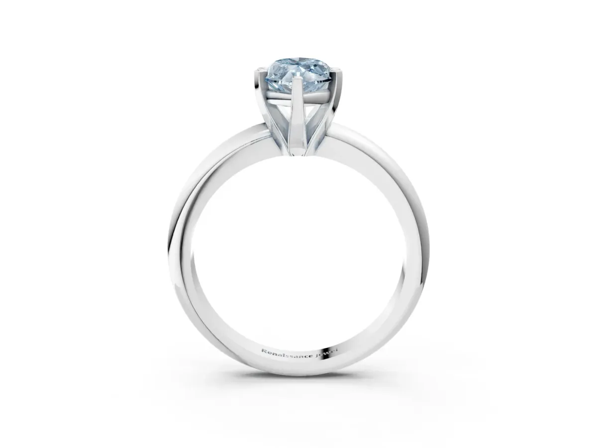 Fancy Blue Marquise Cut Diamond Solitaire Engagement Ring with Round Band and Four-Prong Setting Silver