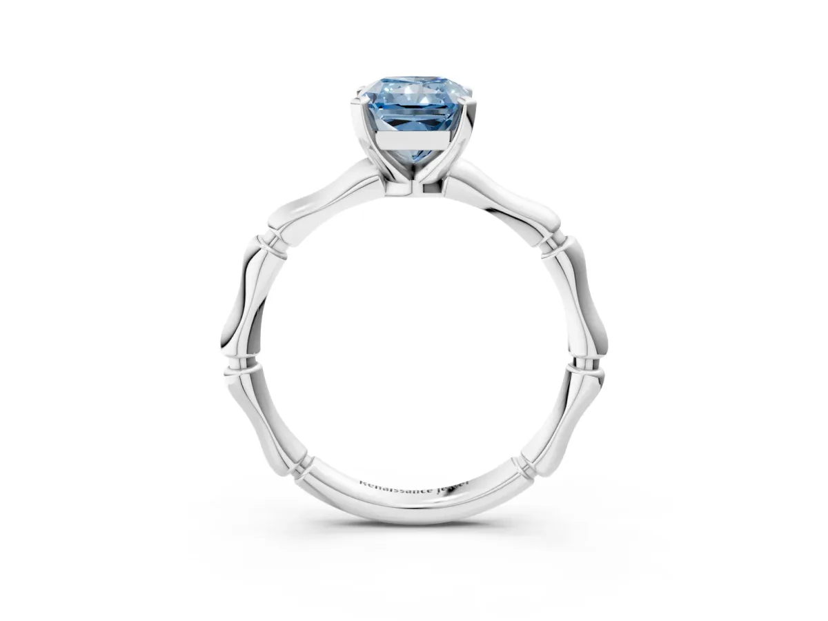 Fancy Blue Radiant Cut Solitaire Diamond Ring with Bamboo Band and Four-Prong Setting Platinum