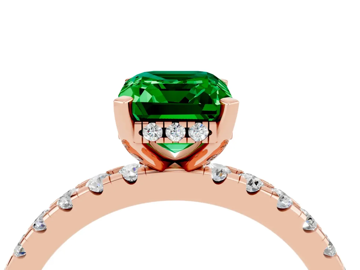 Emerald Cut Emerald Solitaire Ring with Round Pavé Band and Four-Prong Setting Rose gold