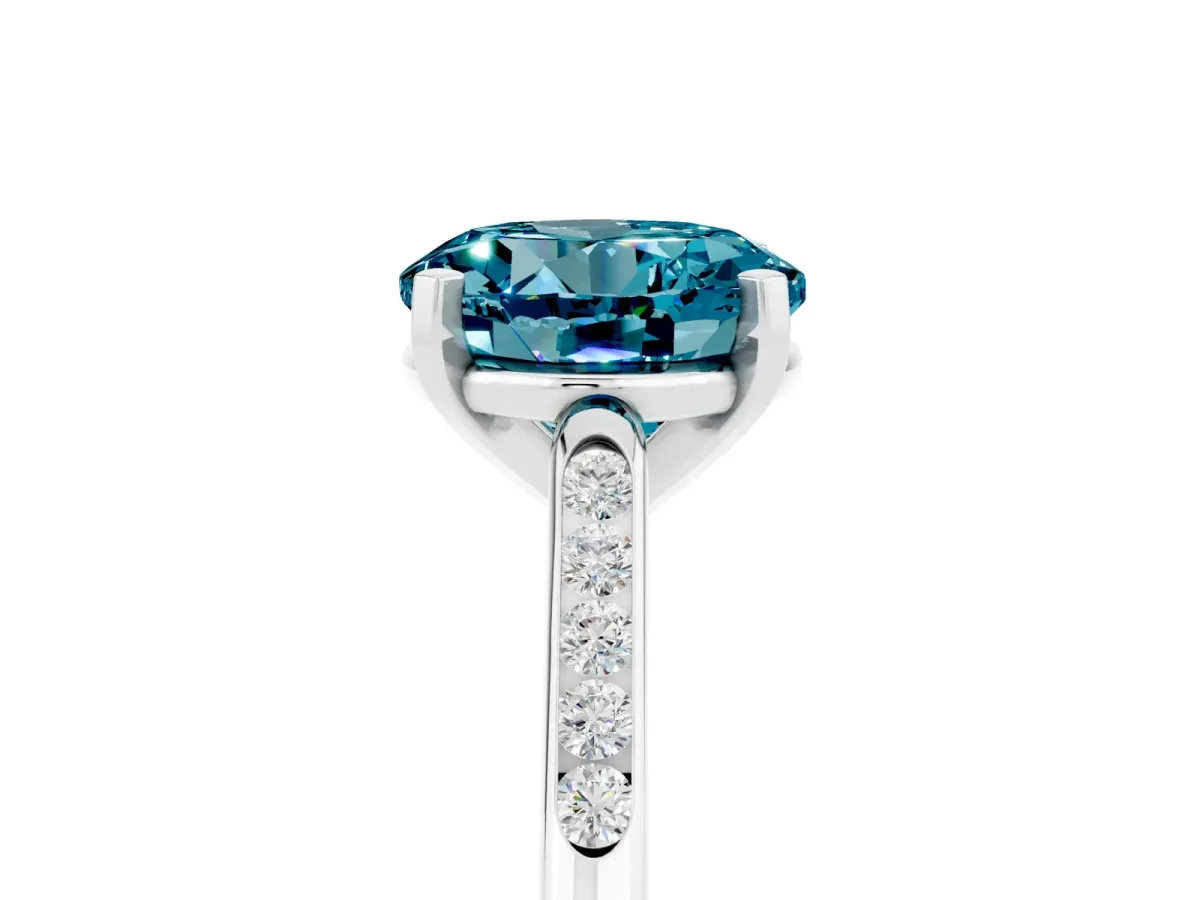 Round Cut Blue Topaz Solitaire Ring with Channel Set Round Band and Prong Setting Silver