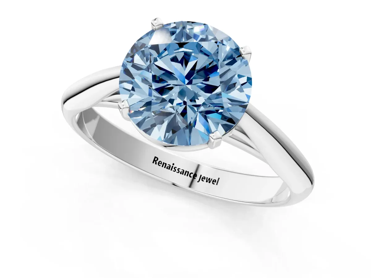 Fancy Blue Round Cut Diamond Solitaire Engagement Ring with Cathedral Setting and Four-Prong Mount White gold