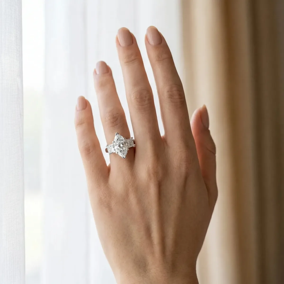 Three-Stone Marquise Cut Cut Diamond Ring with Channel Set Band and Four-Prong Setting Platinum