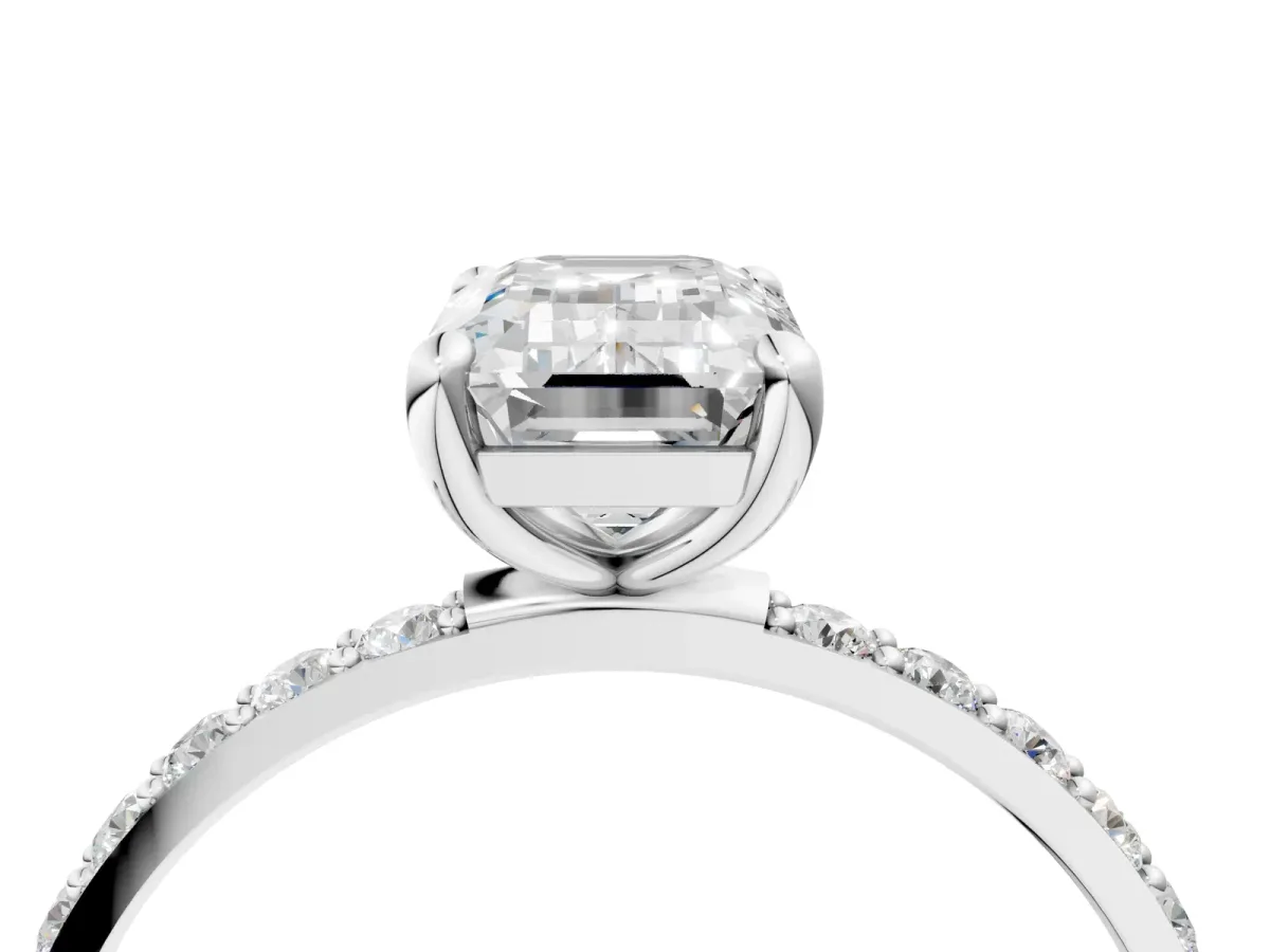 Emerald Cut Diamond Solitaire Ring with Round Moissanite Pavé Band and Prong Setting Silver