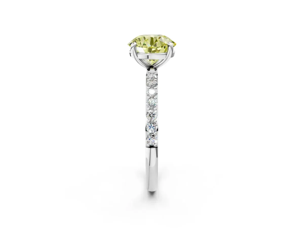 Fancy Yellow Round Cut Diamond Solitaire Ring with Round Pavé Band and Prong Setting Silver