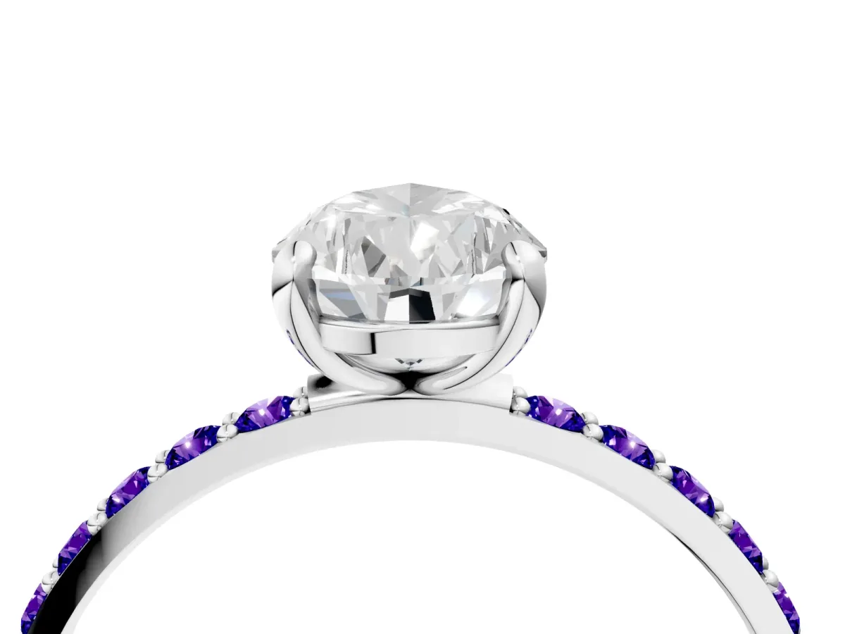 Pear Cut Diamond Solitaire Ring with Round Tanzanite Pavé Band and Prong Setting Silver