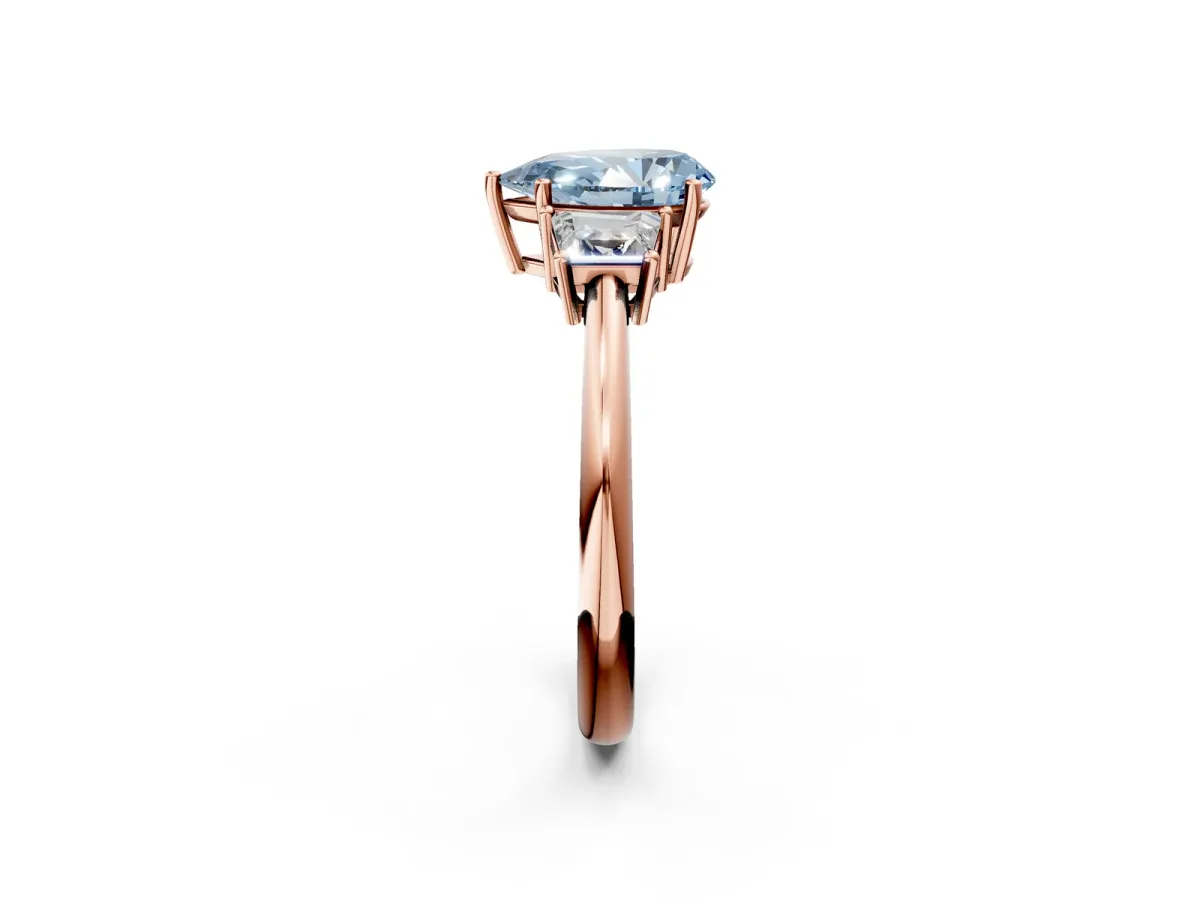 Fancy Blue Pear Cut Diamond Three-Stone Ring with Trapezoid Side Stones and Prong Setting Rose gold