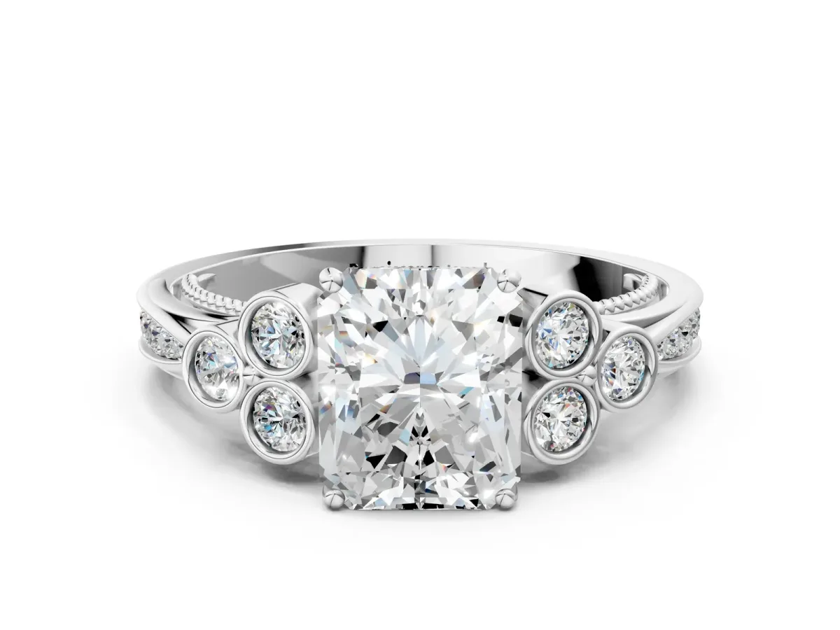 Radiant Cut Cut Diamond Engagement Ring with Bezel Set Round Side Stones and Prong Setting Platinum