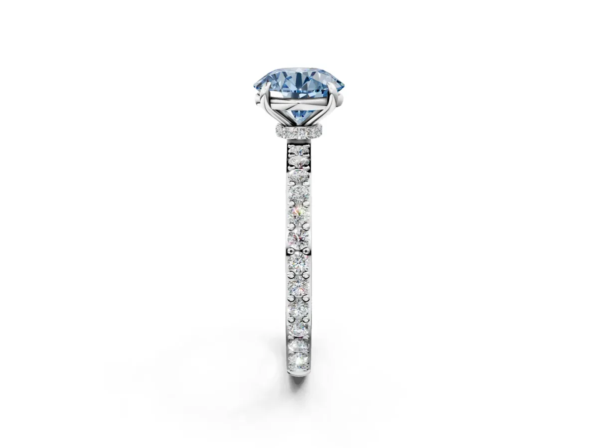 Fancy Blue Round Cut Diamond Solitaire Engagement Ring with Pavé Band and Four-Prong Setting Silver