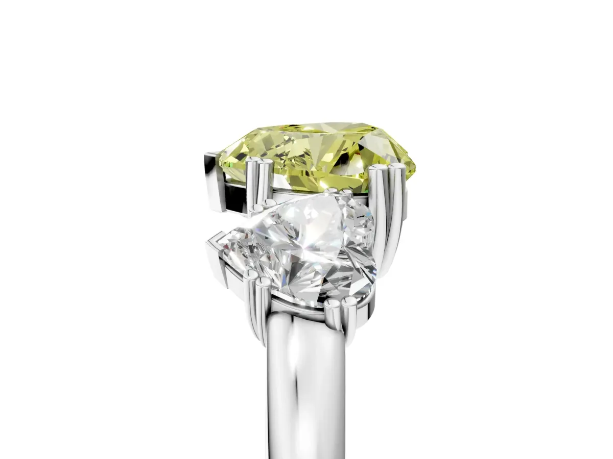 Fancy Yellow Three-Stone Heart Cut Cut Diamond Ring with Channel Set Band and Four-Prong Setting Silver