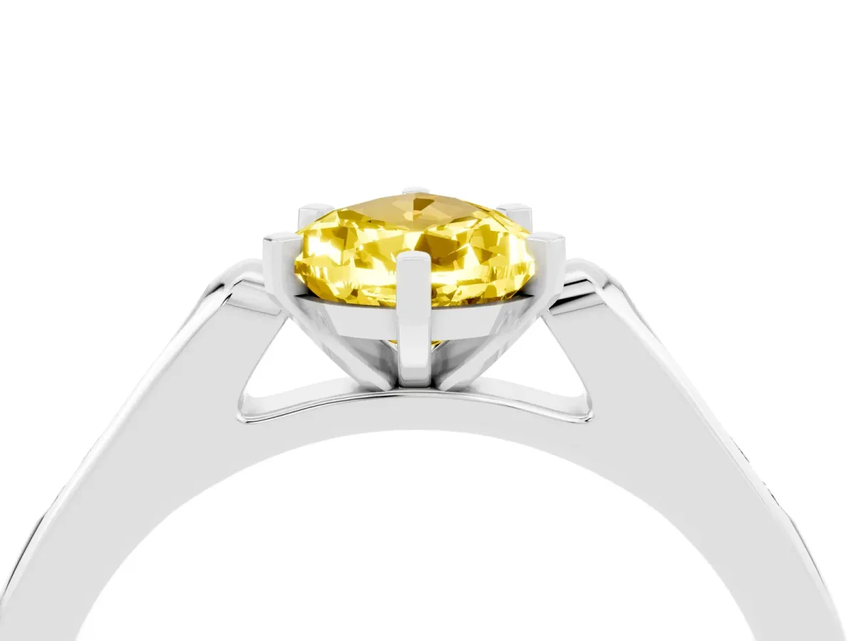 Pear Cut Yellow Sapphire Solitaire Ring with Channel Set Round Band and Prong Setting Silver