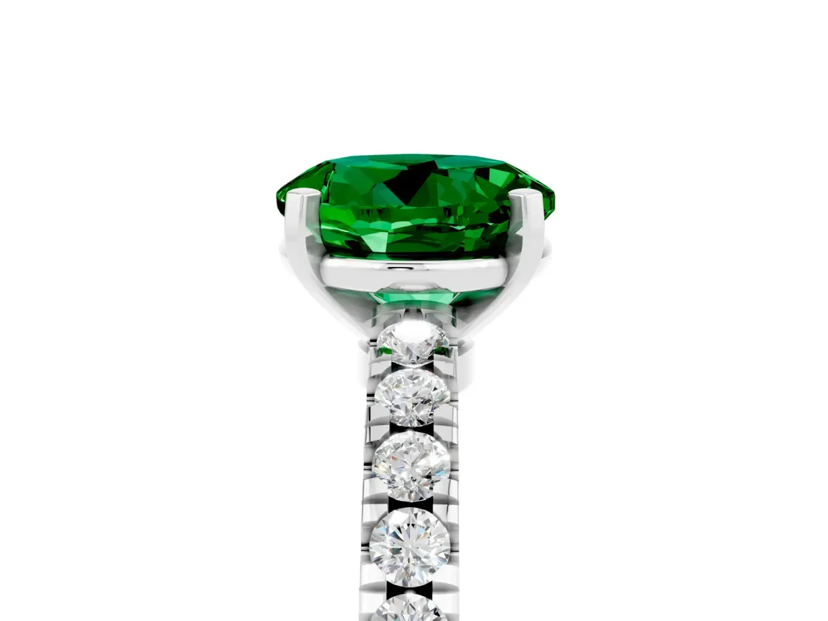 Round Cut Solitaire Emerald with Pavé Band and Four-Prong Setting Silver
