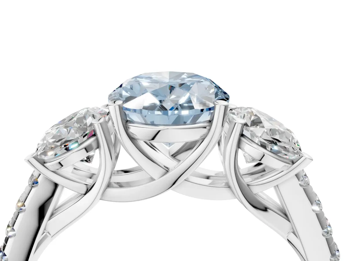 Fancy Blue Three-Stone Oval Cut Diamond Ring with Round Pavé Band and Prong Setting Silver