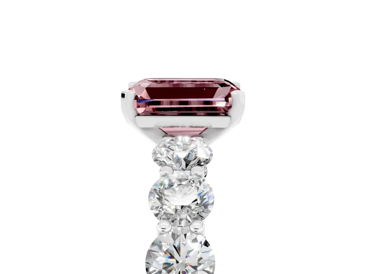 Emerald Cut Morganite Prong Setting with Side Stones on a Pave Band Platinum
