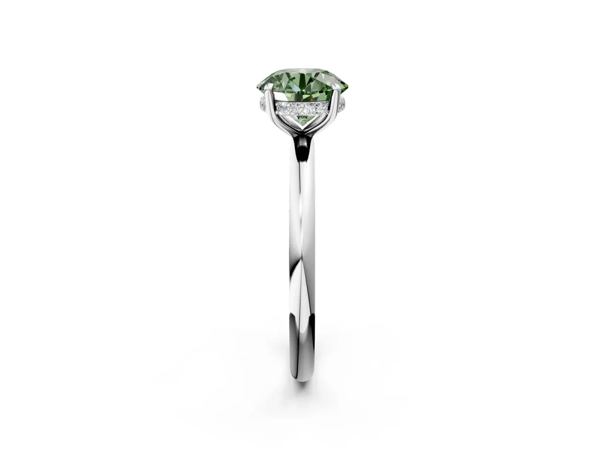 Fancy Green Round Cut Diamond Solitaire Ring with Thin Band and Four-Prong Setting Silver