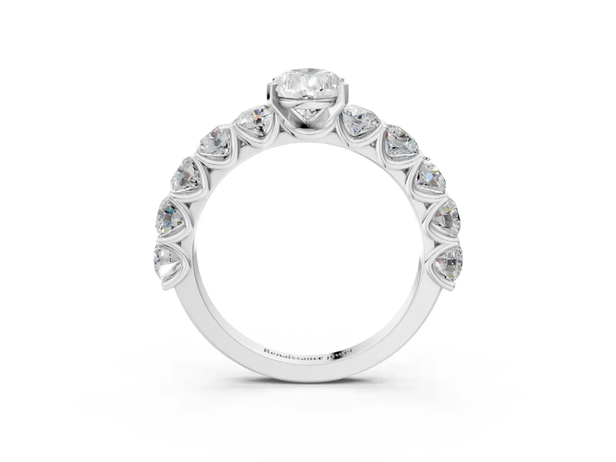 Pear Cut Diamond Prong Setting with Side Stones on a Pave Band Silver