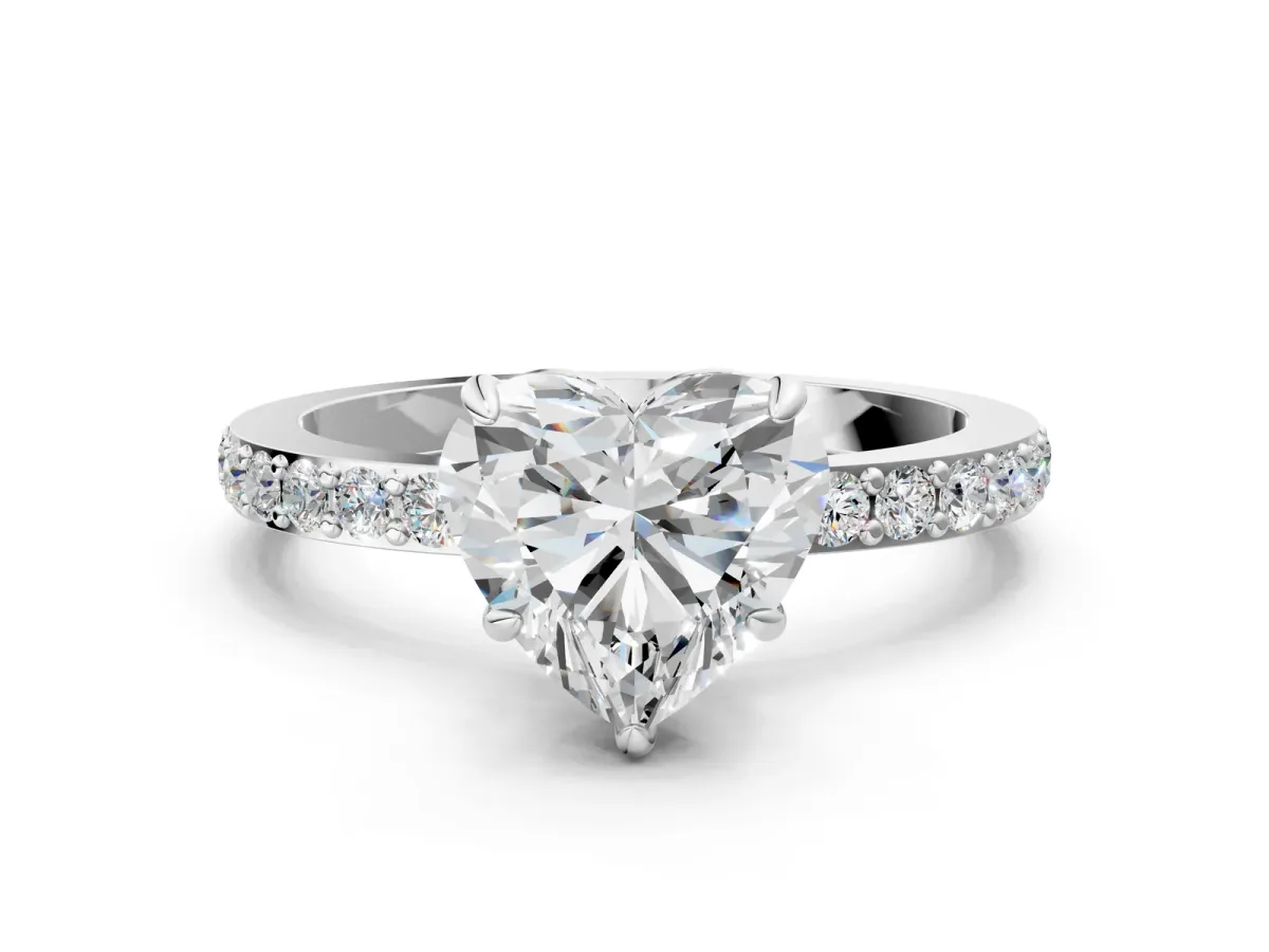 Heart Cut Diamond Solitaire Engagement Ring with Pavé Band and Four-Prong Setting Silver