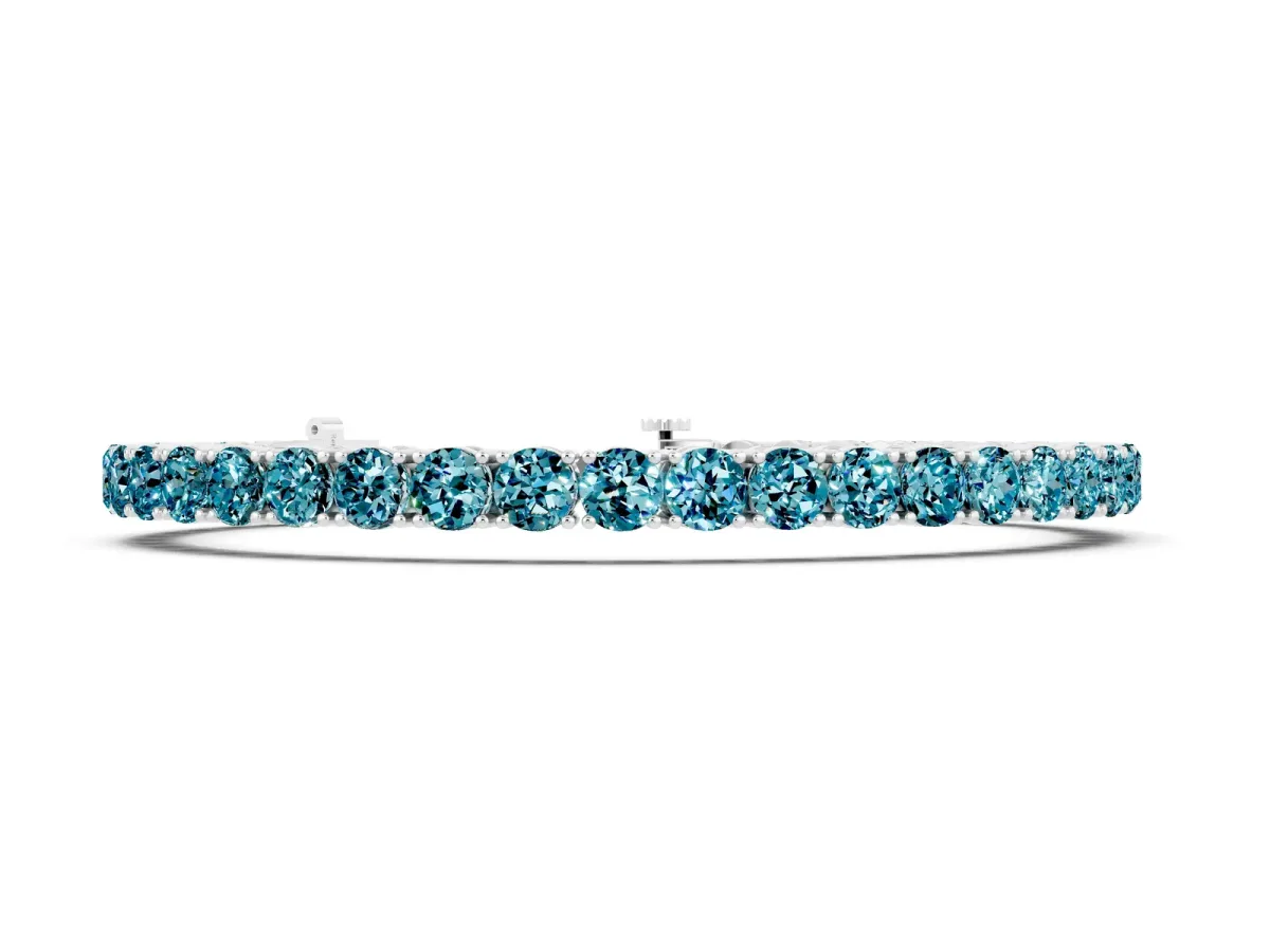 Round Brilliant Blue Topaz Tennis Bracelet with Prong Setting Silver