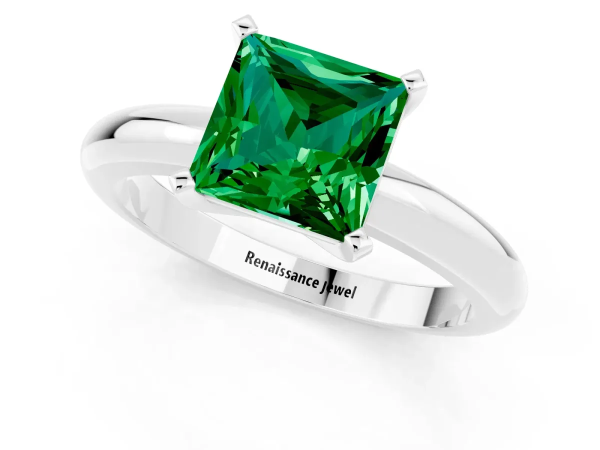Princess Cut Emerald Solitaire Engagement Ring with Round Band and Four-Prong Setting Silver