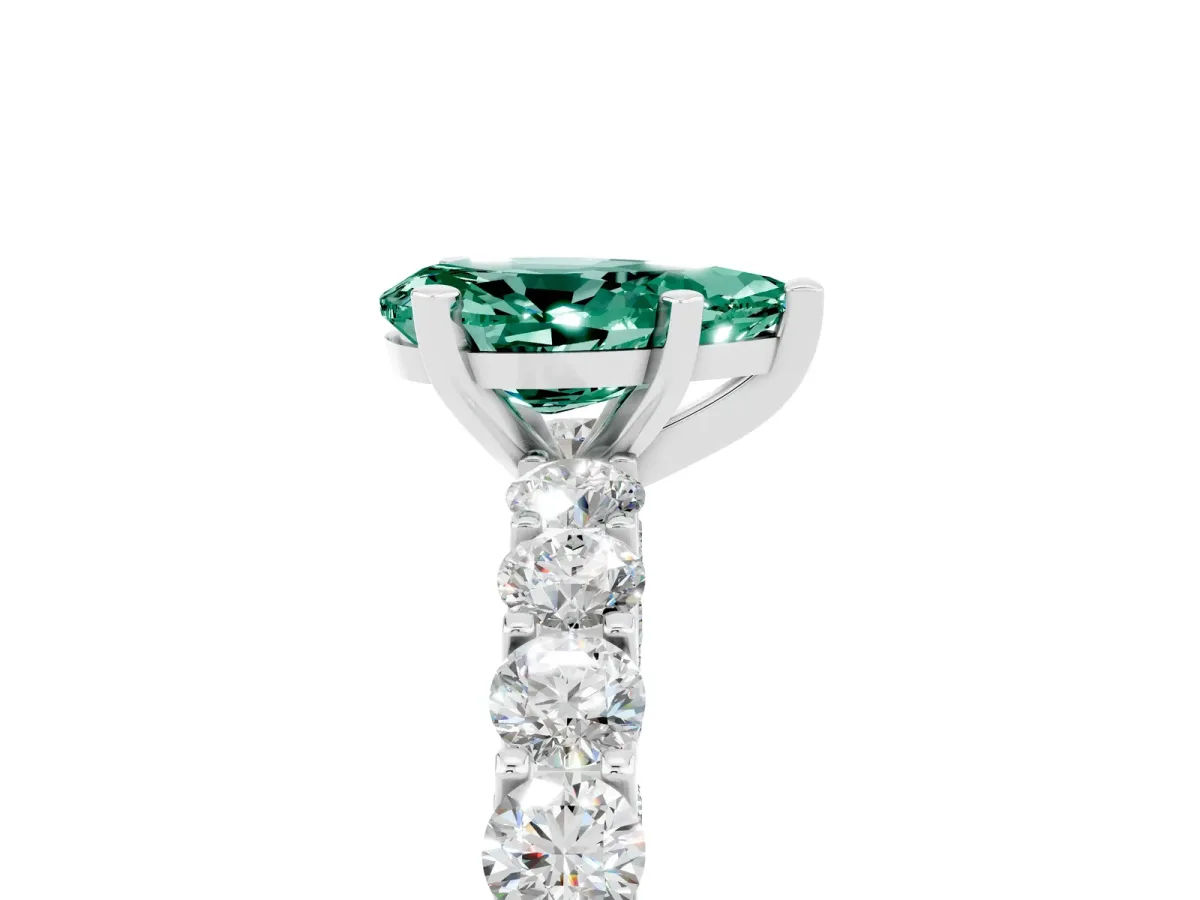 Pear Cut Green Sapphire Solitaire Ring with Shared Prong Pavé Band and Four-Prong Setting Silver