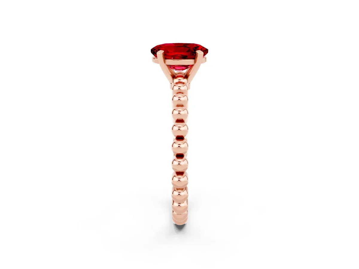 Oval Cut Ruby Solitaire Ring with Beaded Band and Prong Setting Rose gold