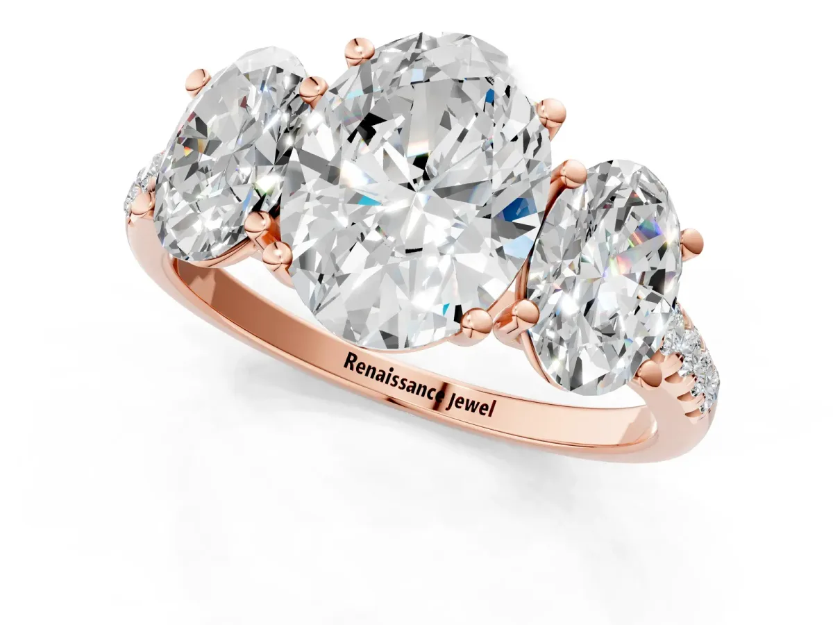 Three-Stone Oval Cut Diamond Ring with Round Pavé Band and Prong Setting Rose gold