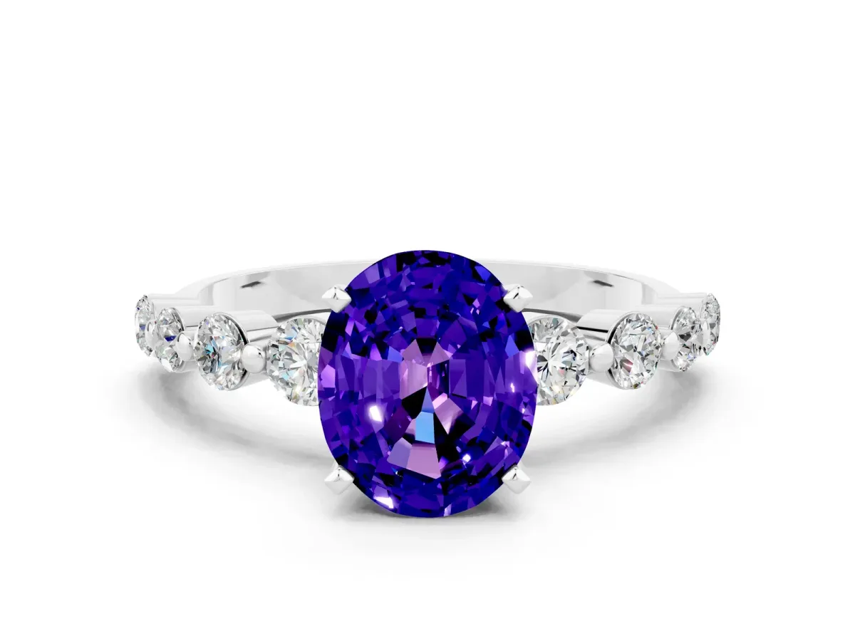 Oval Cut Solitaire Tanzanite Ring with Pave Band and Four-Prong Setting Silver