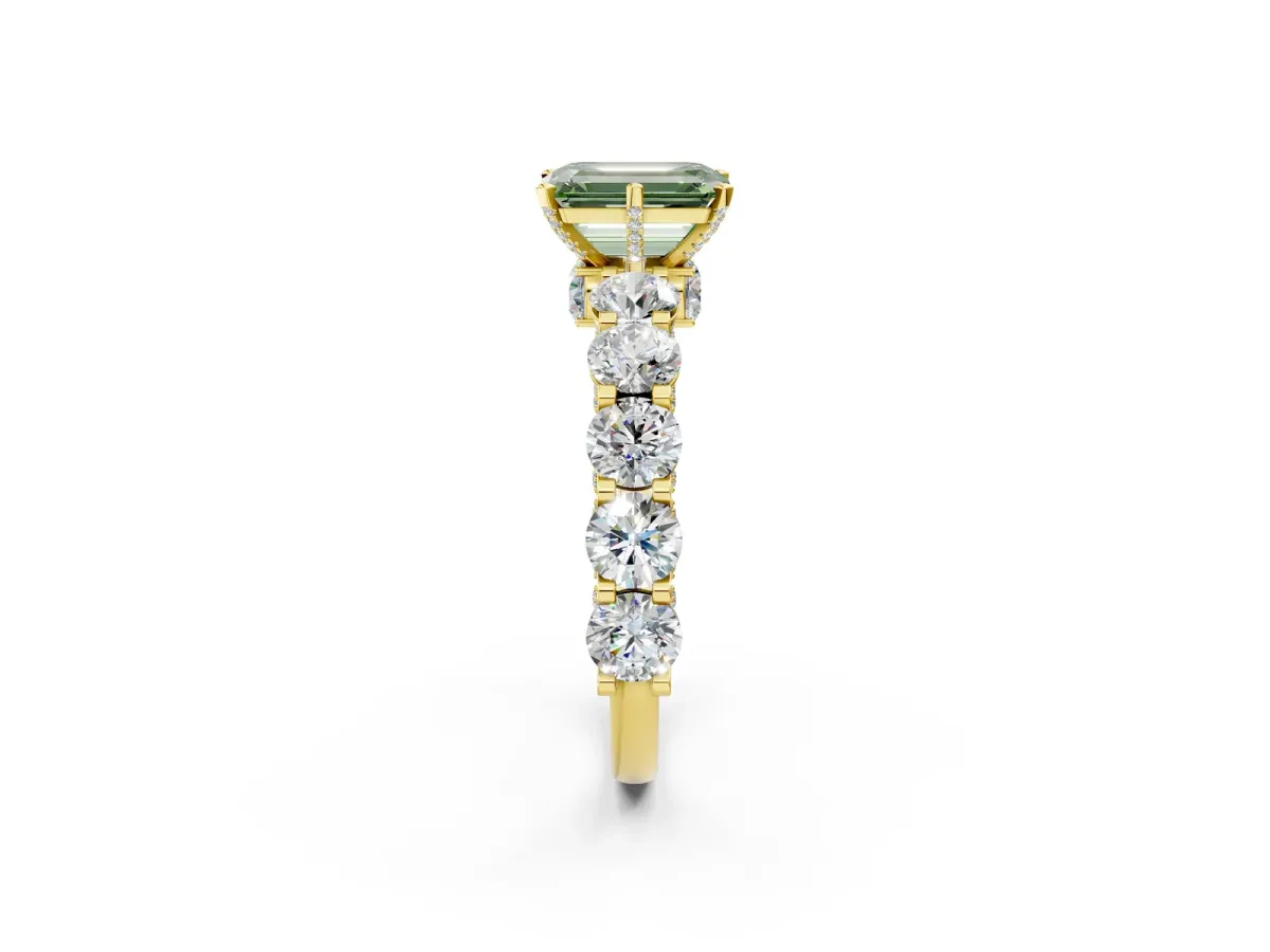 Fancy Green Emerald Cut Diamond Side Stone Engagement Ring with Four-Prong Setting Yellow gold