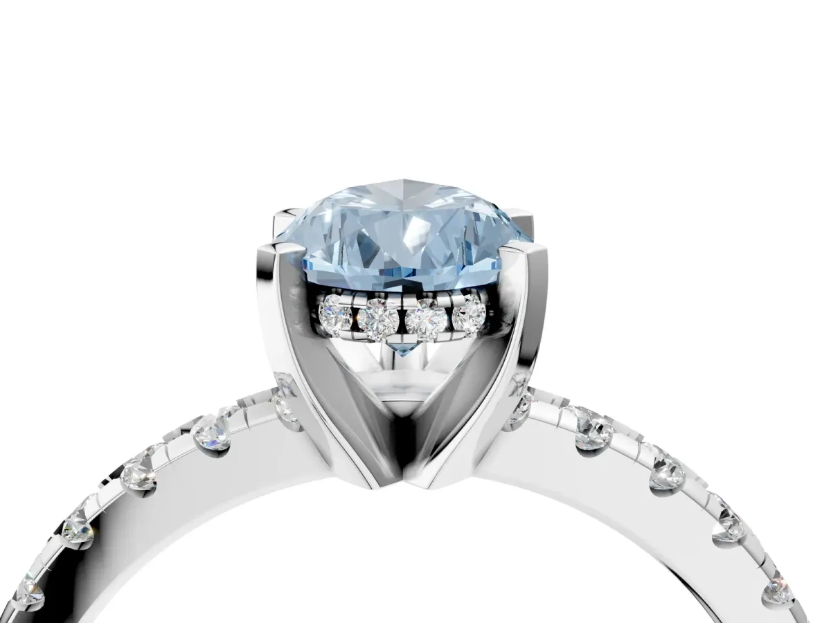 Fancy Blue Pear Cut Diamond Solitaire Ring with Round Pavé Band and Four-Prong Setting Silver