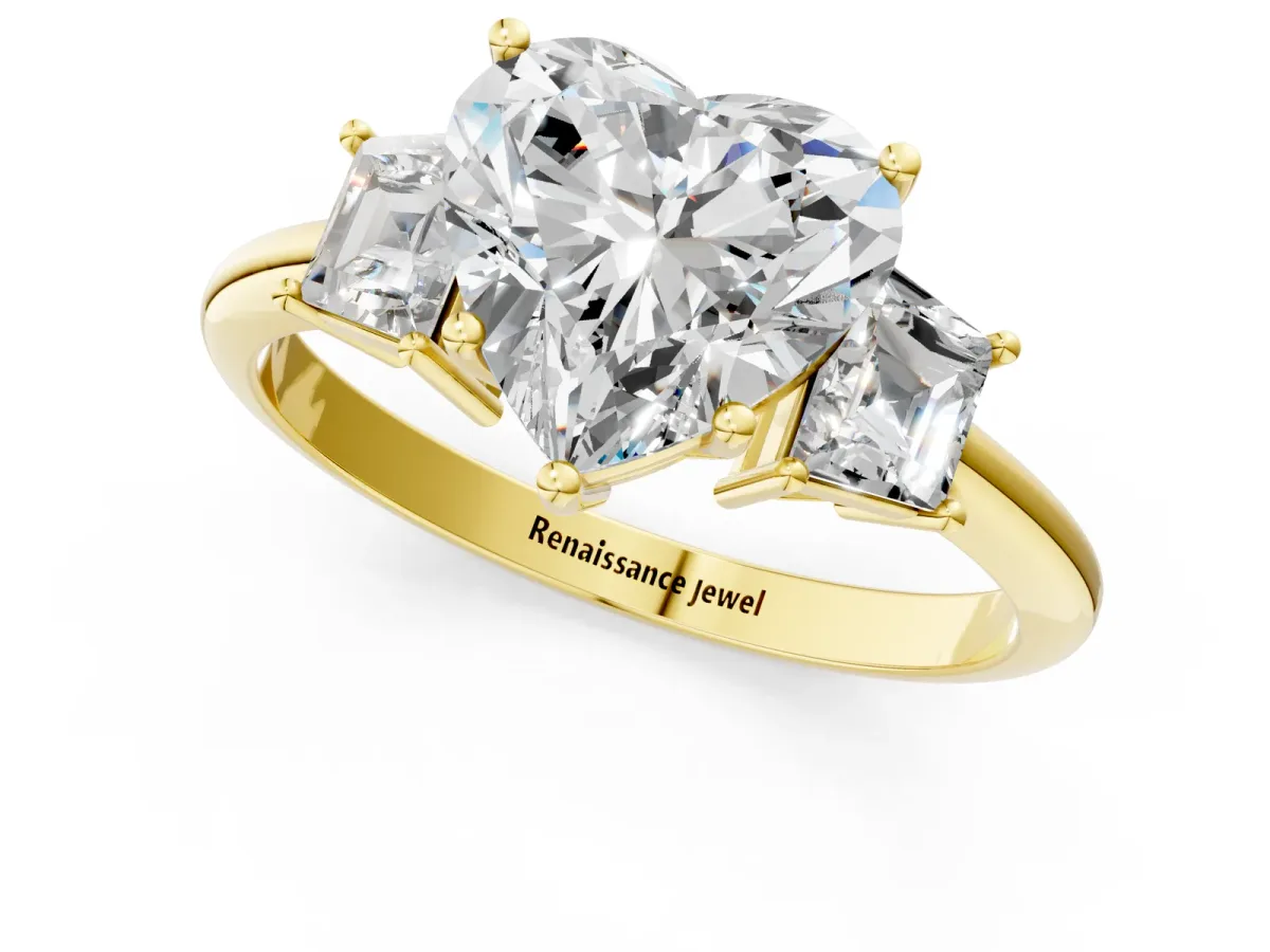 Heart Cut Diamond Three-Stone Ring with Trapezoid Side Stones and Prong Setting Yellow gold