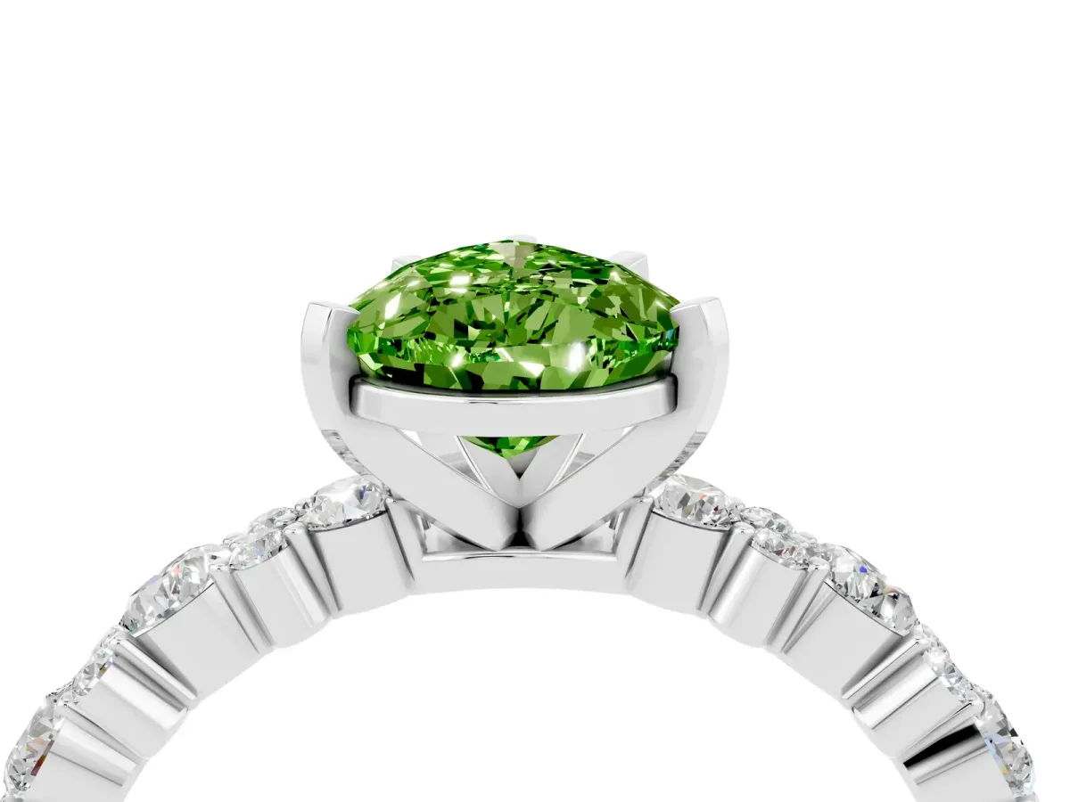 Pear Cut Peridot Side Stone Solitaire Ring with Round and Four-Prong Setting White gold