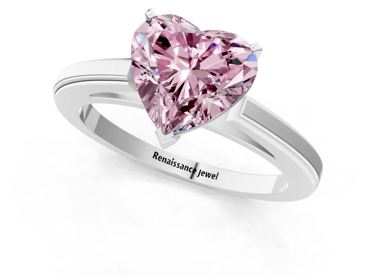 Fancy Pink Heart Cut Solitaire Diamond Ring with Four-Prong Setting and Classic Band Platinum