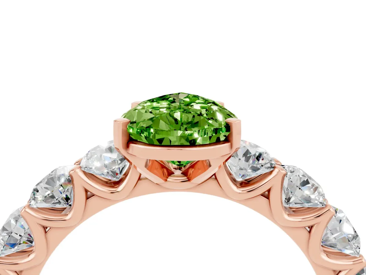 Pear Cut Peridot Prong Setting with Side Stones on a Pave Band Rose gold