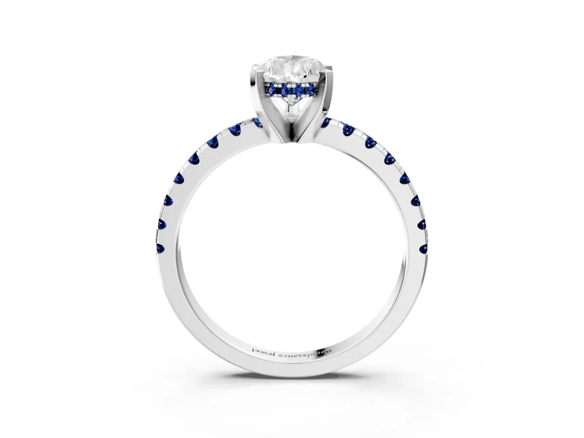 Pear Cut Diamond Solitaire Ring with Round Blue Sapphire Pavé Band and Four-Prong Setting Silver