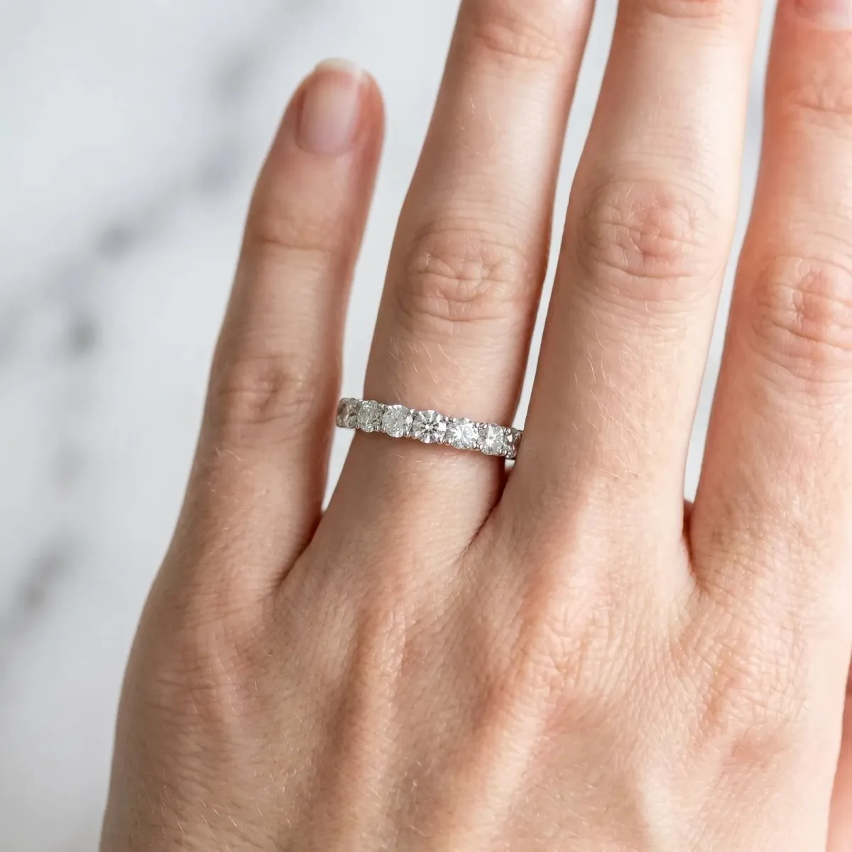 Round Diamond Half-Eternity Band with Shared Prong Setting Platinum