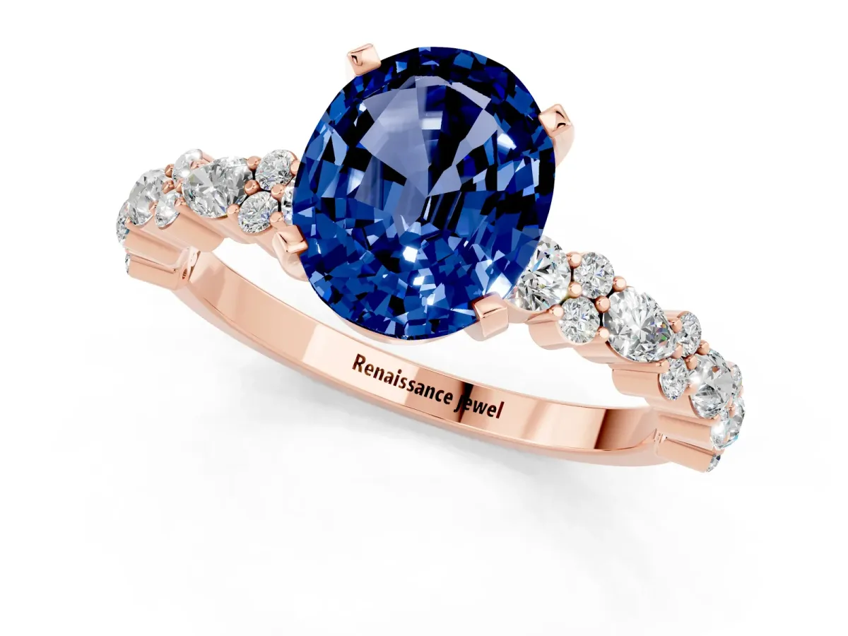 Oval Cut Blue Sapphire Side Stone Solitaire Ring with Round and Four-Prong Setting Rose gold