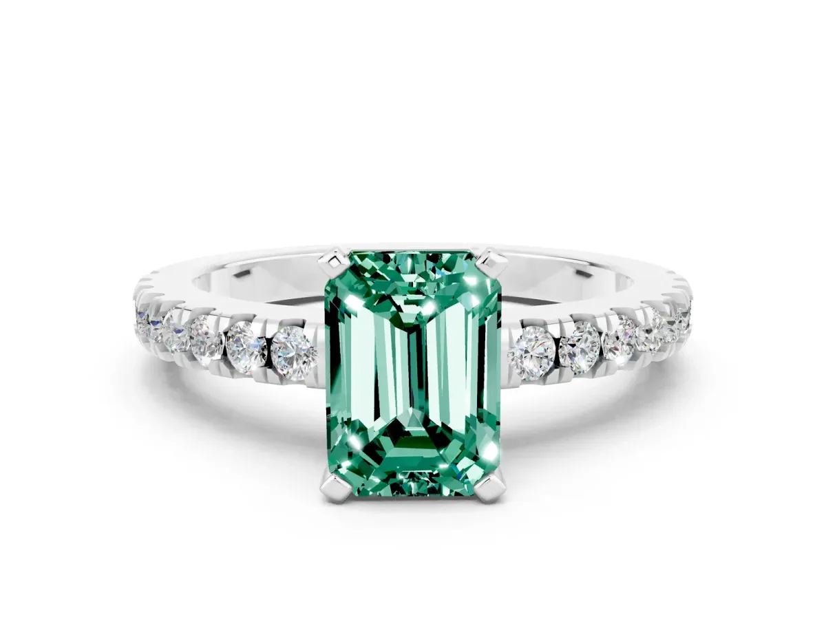 Emerald Cut Solitaire Green Sapphire with Pavé Band and Four-Prong Setting Silver