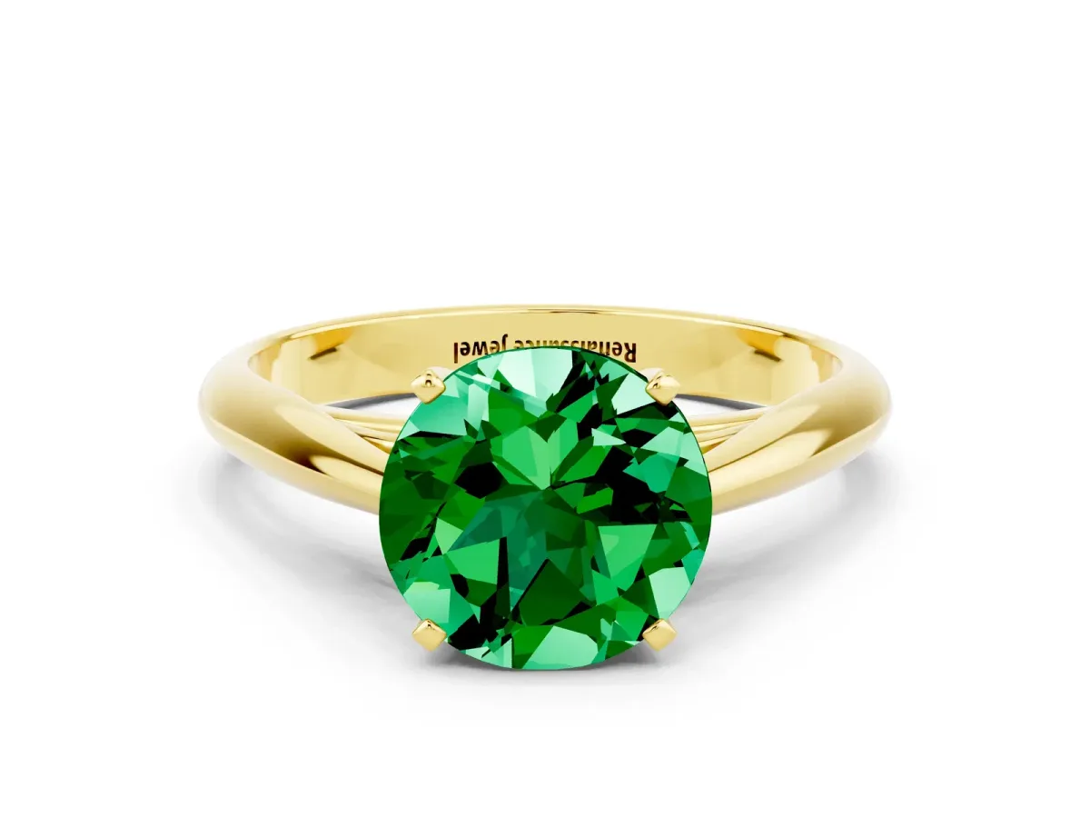 Round Cut Emerald Solitaire Engagement Ring with Cathedral Setting and Four-Prong Mount Yellow gold
