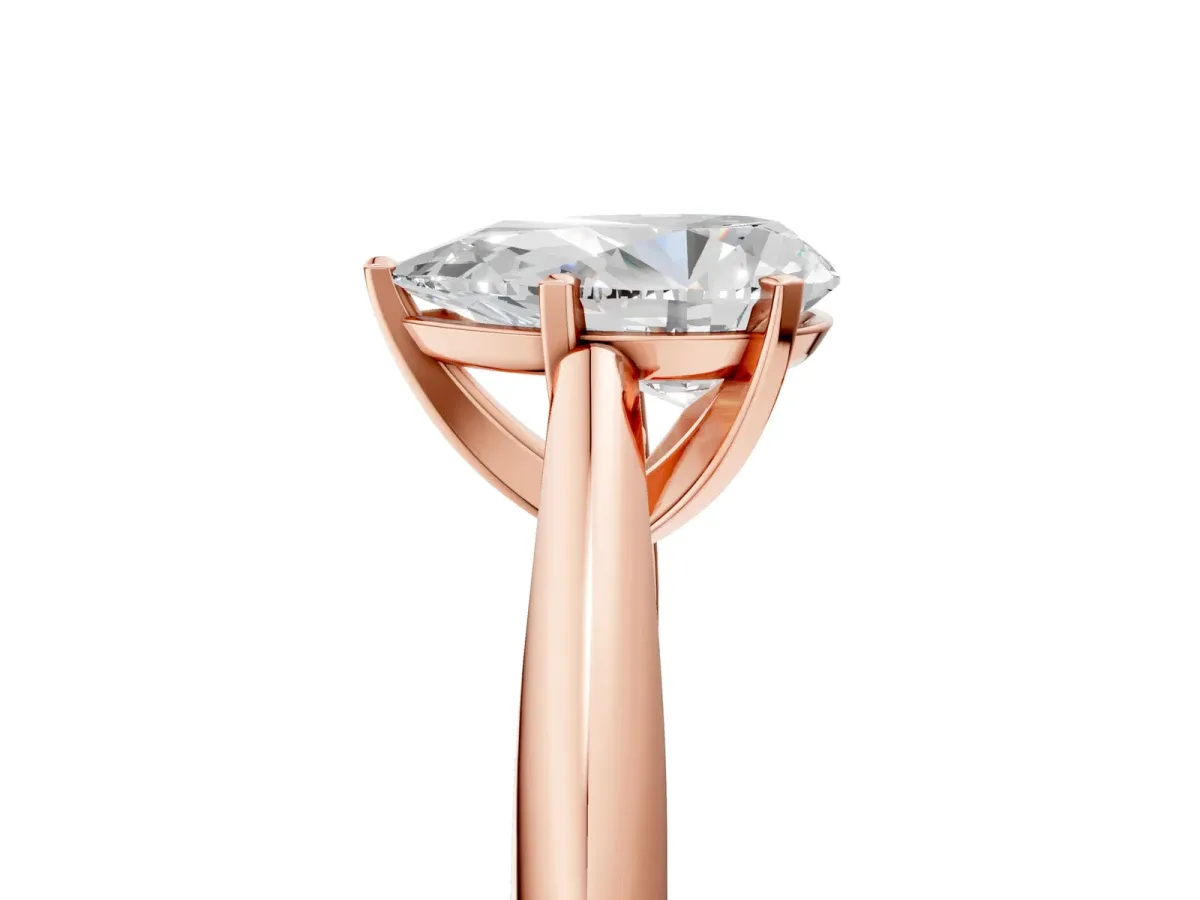 Pear Cut Diamond Solitaire Engagement Ring with Cathedral Setting and Four-Prong Mount Rose gold