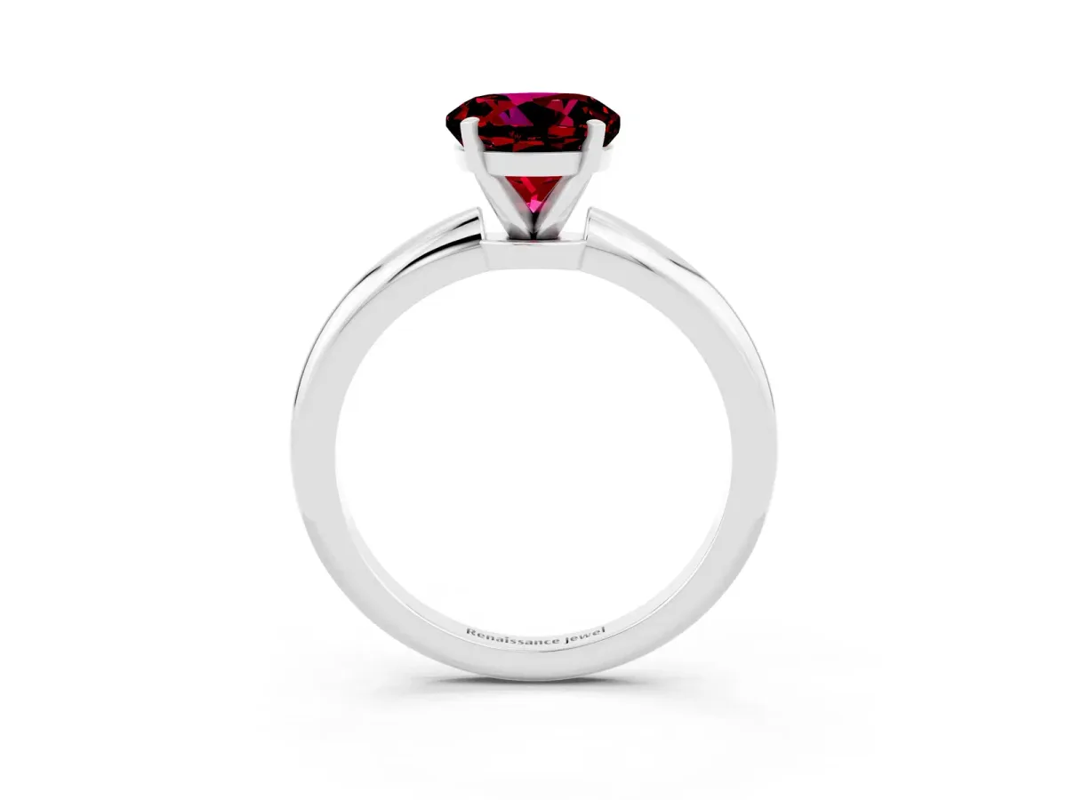 Round Cut Garnet Solitaire Ring with Six-Prong Setting and Classic Band Platinum
