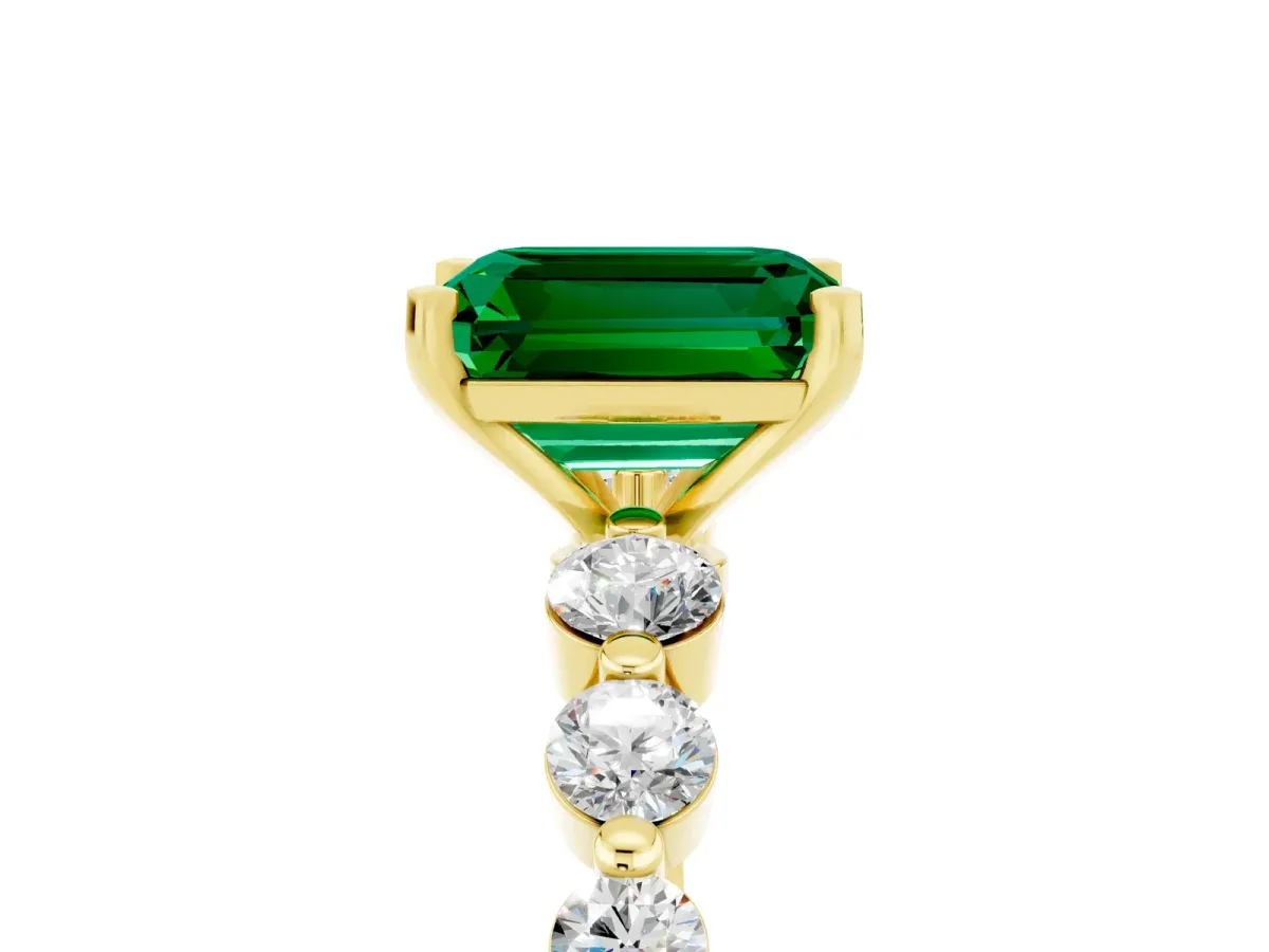 Emerald Cut Solitaire Emerald Ring with Pave Band and Four-Prong Setting Yellow gold