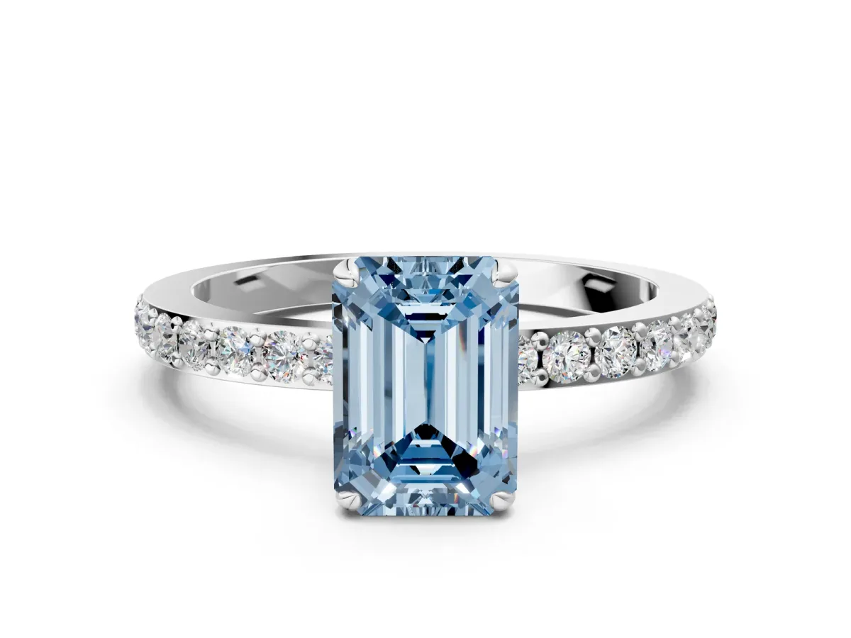 Fancy Blue Emerald Cut Diamond Solitaire Engagement Ring with Pavé Band and Four-Prong Setting Silver