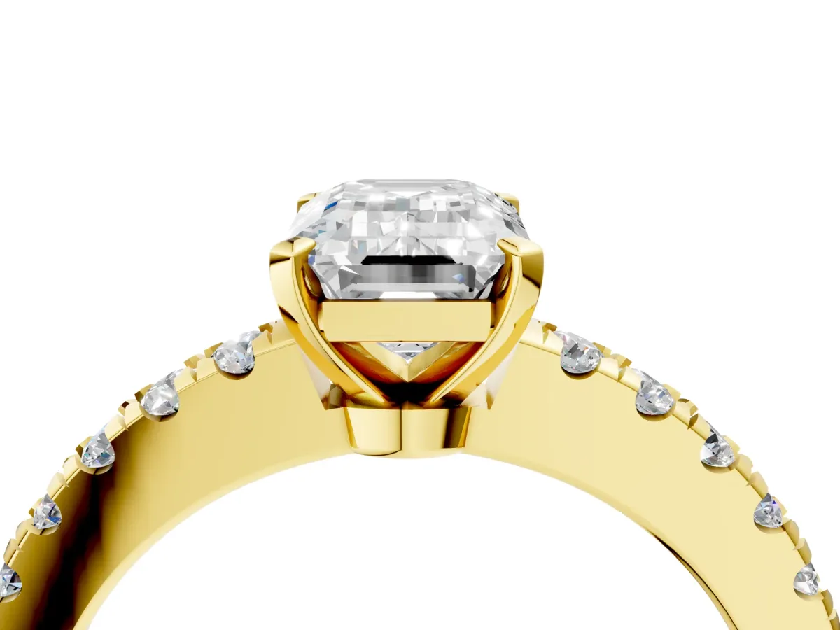Emerald Cut Solitaire Diamond with Pavé Band and Four-Prong Setting Yellow gold