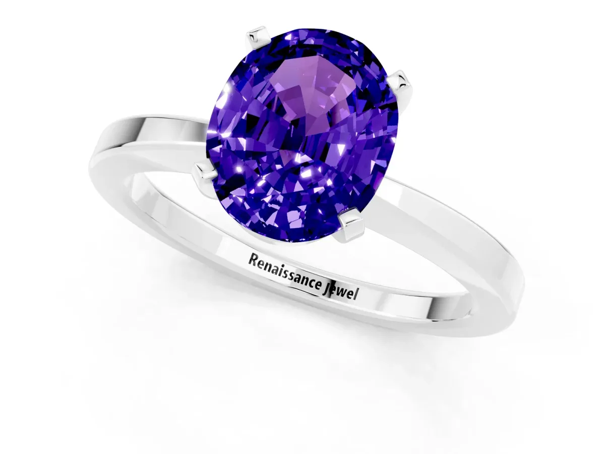Oval Cut Tanzanite Solitaire Engagement Ring with Classic Band and Four-Prong Setting Silver