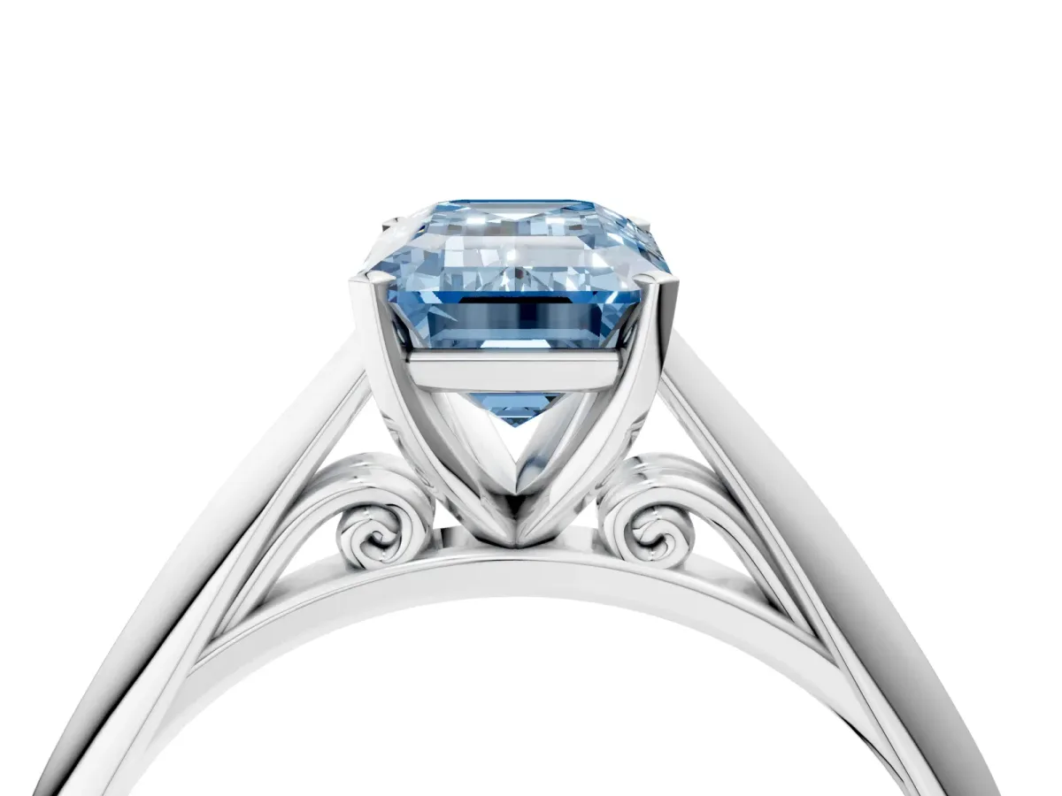 Fancy Blue Emerald Cut Diamond Solitaire Engagement Ring with Cathedral Setting and Four-Prong Mount White gold