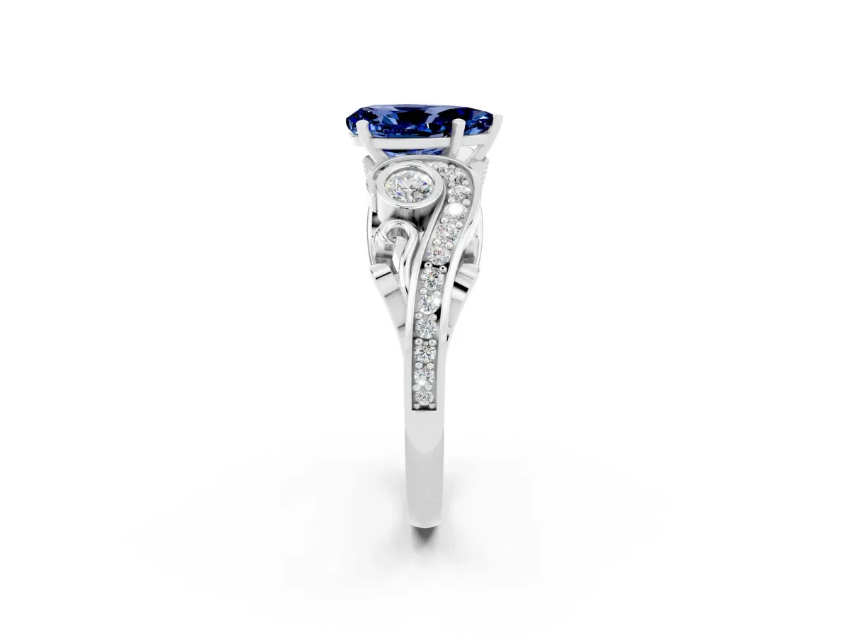 Pear Cut Blue Sapphire Solitaire Ring with Milgrain Pavé Band and Four-Prong Setting Silver
