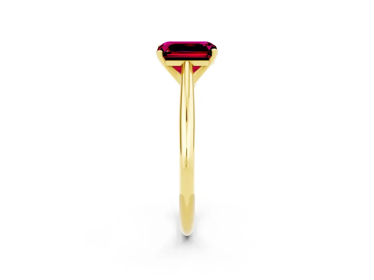 Emerald Cut Garnet Solitaire Engagement Ring with Cathedral Setting and Four-Prong Mount Yellow gold
